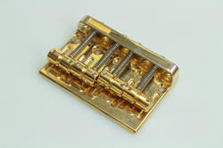 Goto-based bridge for four-stringed bridges