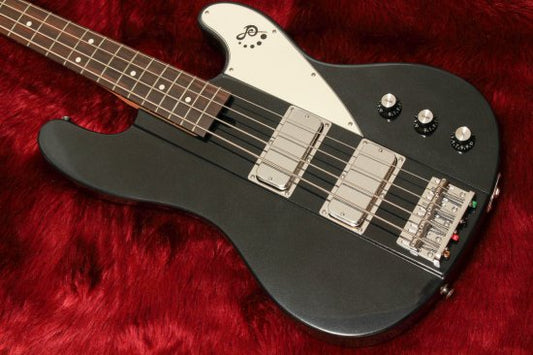 Even with your finger or pick, one that produces a fine sound either